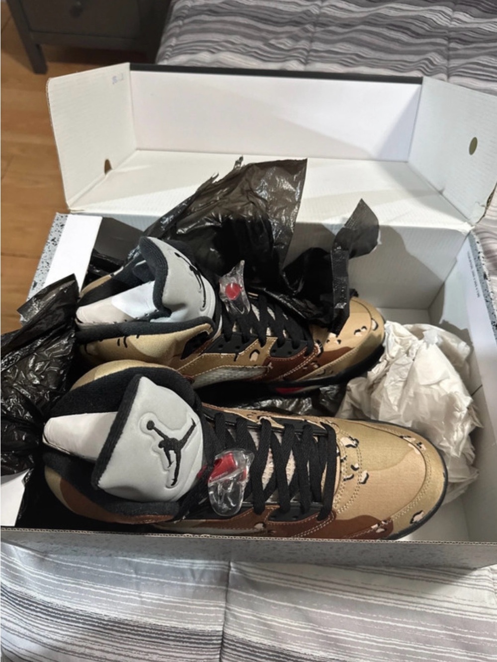 Supreme Tan and Black High-Top Sneakers
